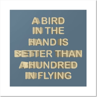 A bird in the hand is better than a hundred in flyng Posters and Art